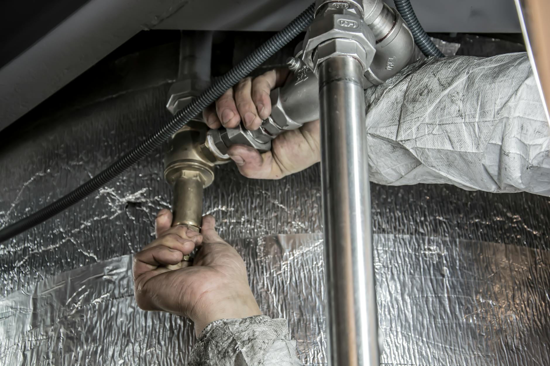 Roto-Rooter plumber at work in Kansas City